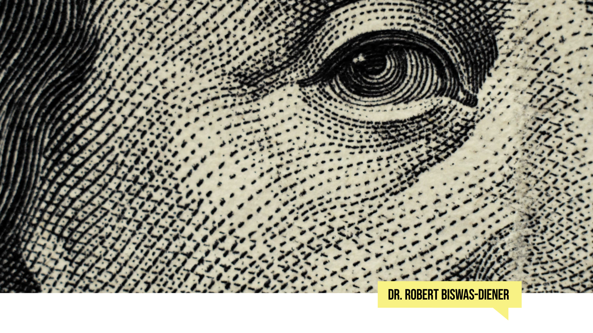 close up of Benjamin Franklin's face on the hundred dollar bill