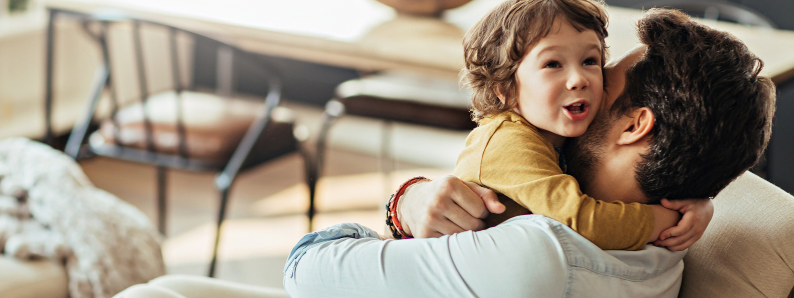 Man hugging child