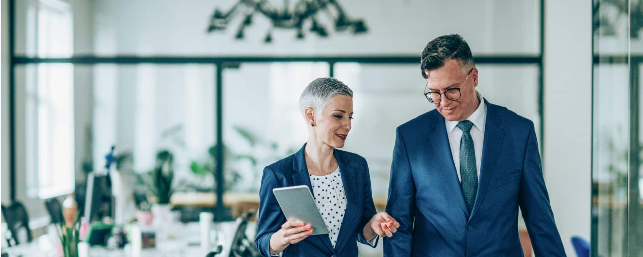 Man and woman meeting in office