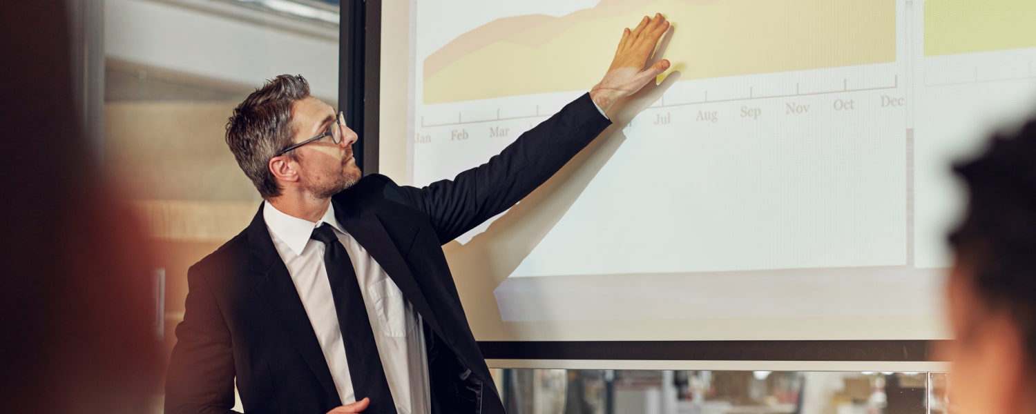 Man presenting financial data