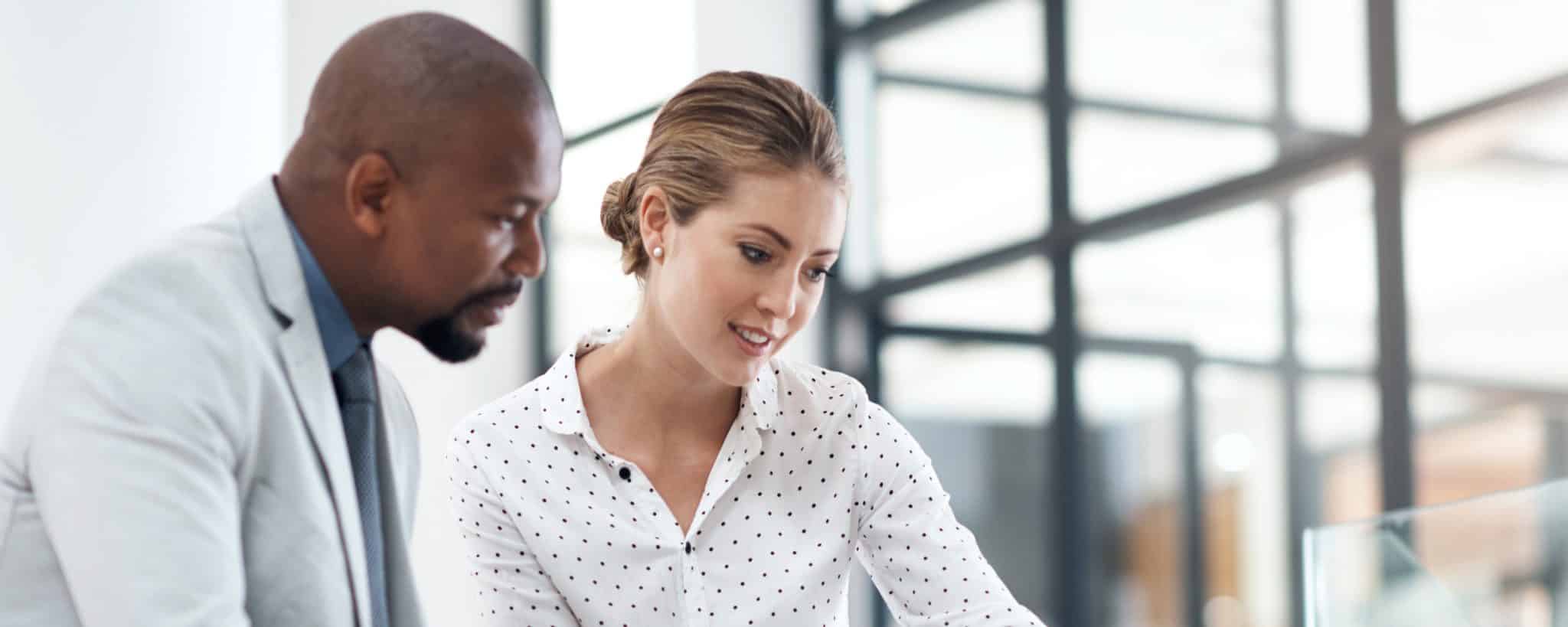 Man and woman meeting in office